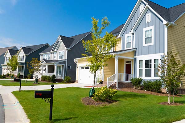 stock photo of houses with blue on the front